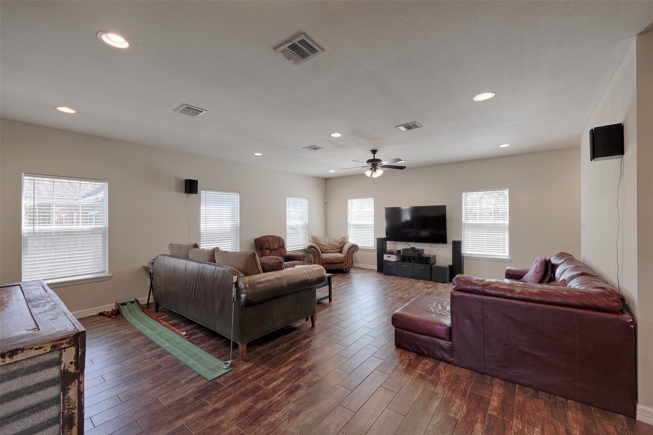 1122 Detroit Street College Station, TX 77840 - Photo 6 of 48 Front door opens into the spacious living room. Wood-look tile floors, fresh paint and blinds thru out make this space ready for the next round of roommates.