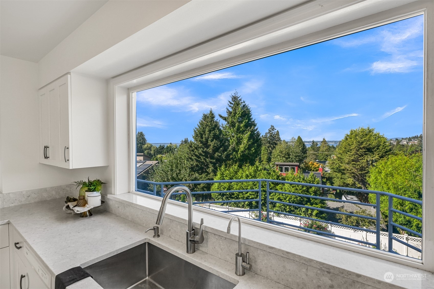 215 Bayside Road Bellingham, WA 98225 - Photo 16 of 38 a view of a chairs and table in the balcony
