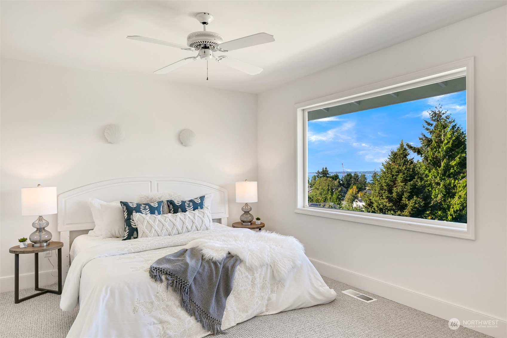 215 Bayside Road Bellingham, WA 98225 - Photo 20 of 38 a bedroom with a large bed and a window