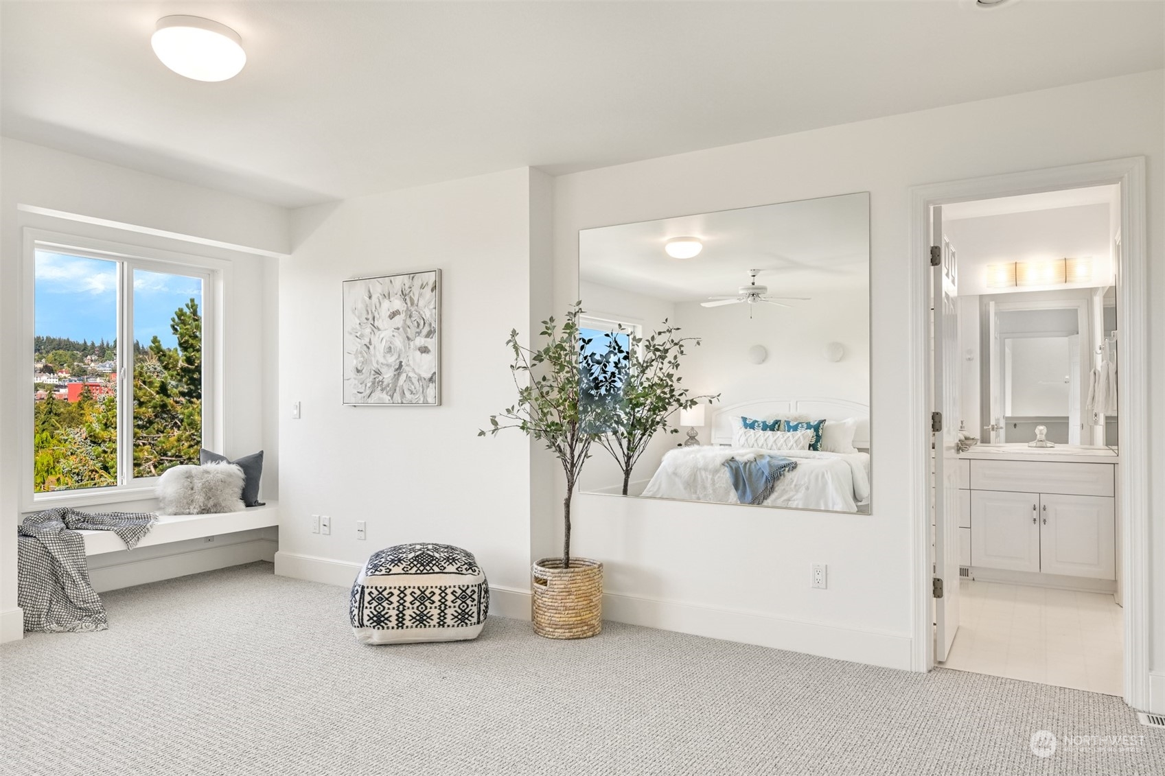 215 Bayside Road Bellingham, WA 98225 - Photo 21 of 38 a living room with furniture and a potted plant