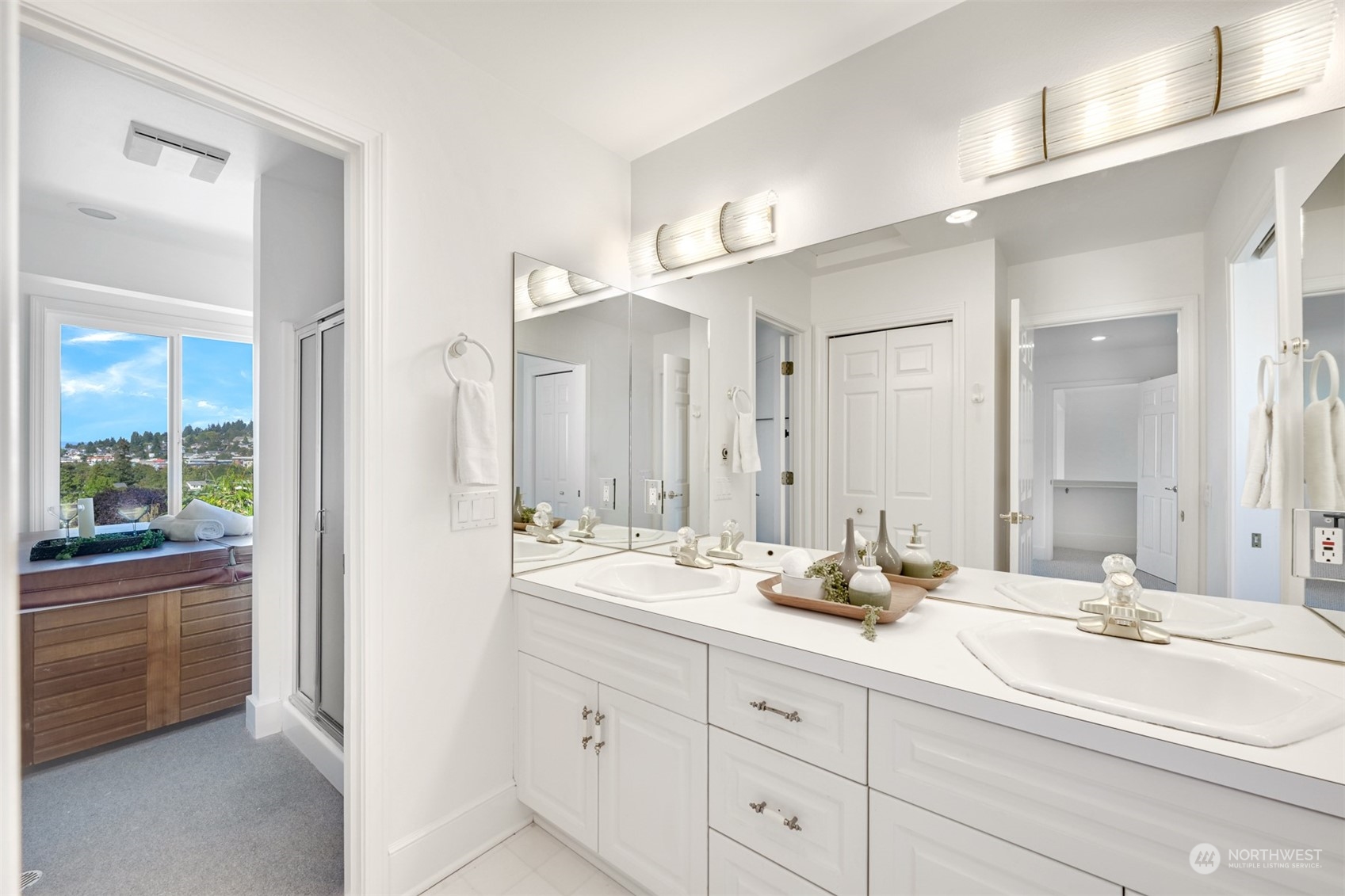 215 Bayside Road Bellingham, WA 98225 - Photo 22 of 38 a bathroom with double vanity and a mirror