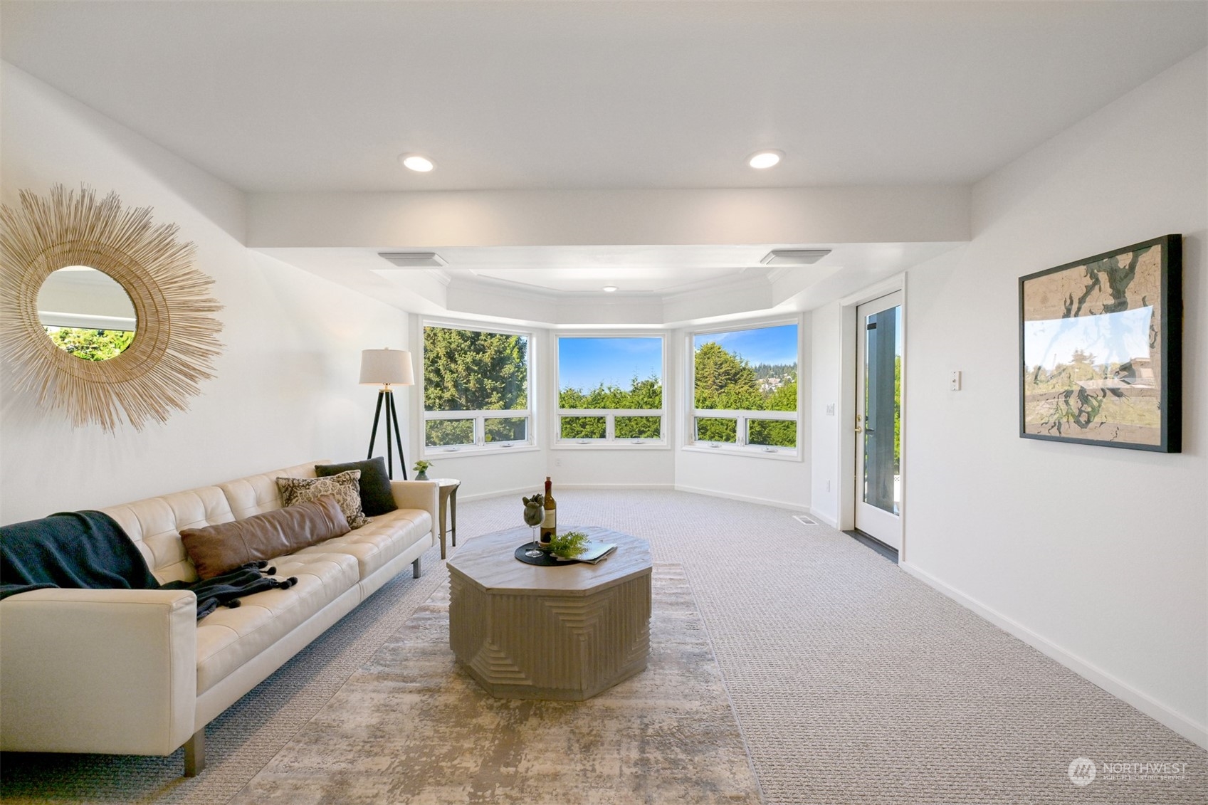 215 Bayside Road Bellingham, WA 98225 - Photo 24 of 38 a living room with furniture and a large window