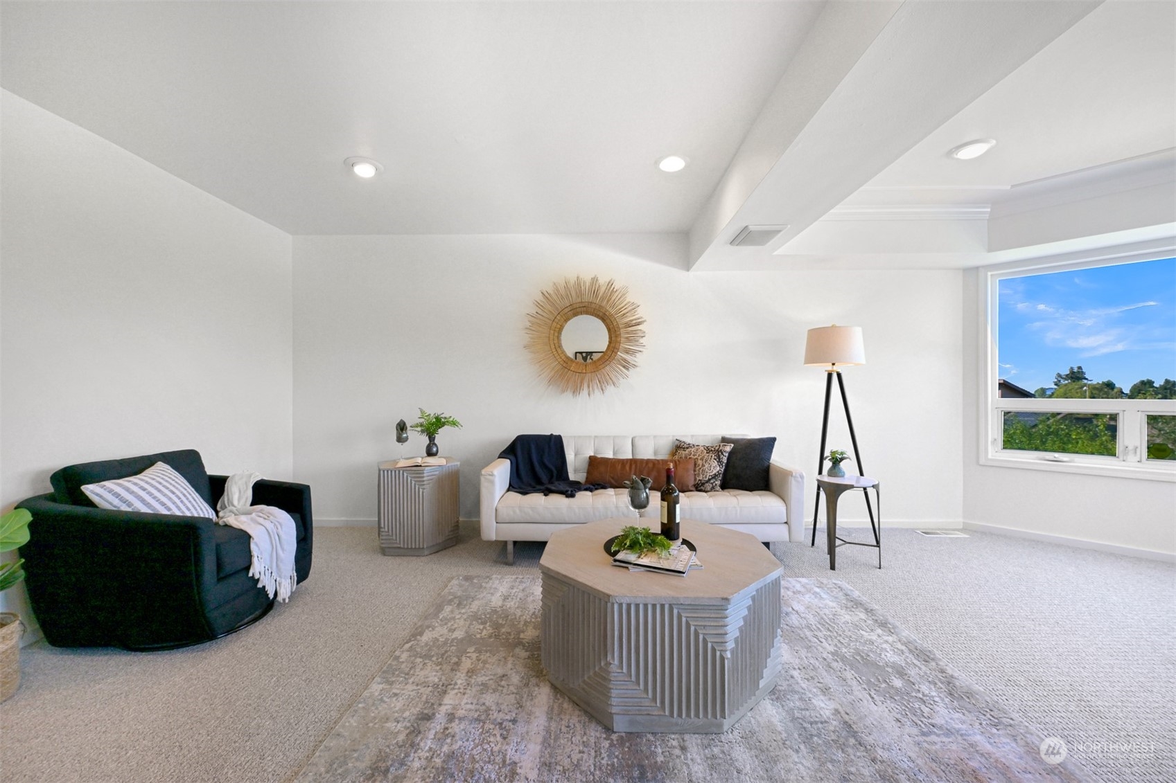 215 Bayside Road Bellingham, WA 98225 - Photo 25 of 38 a living room with furniture and a potted plant