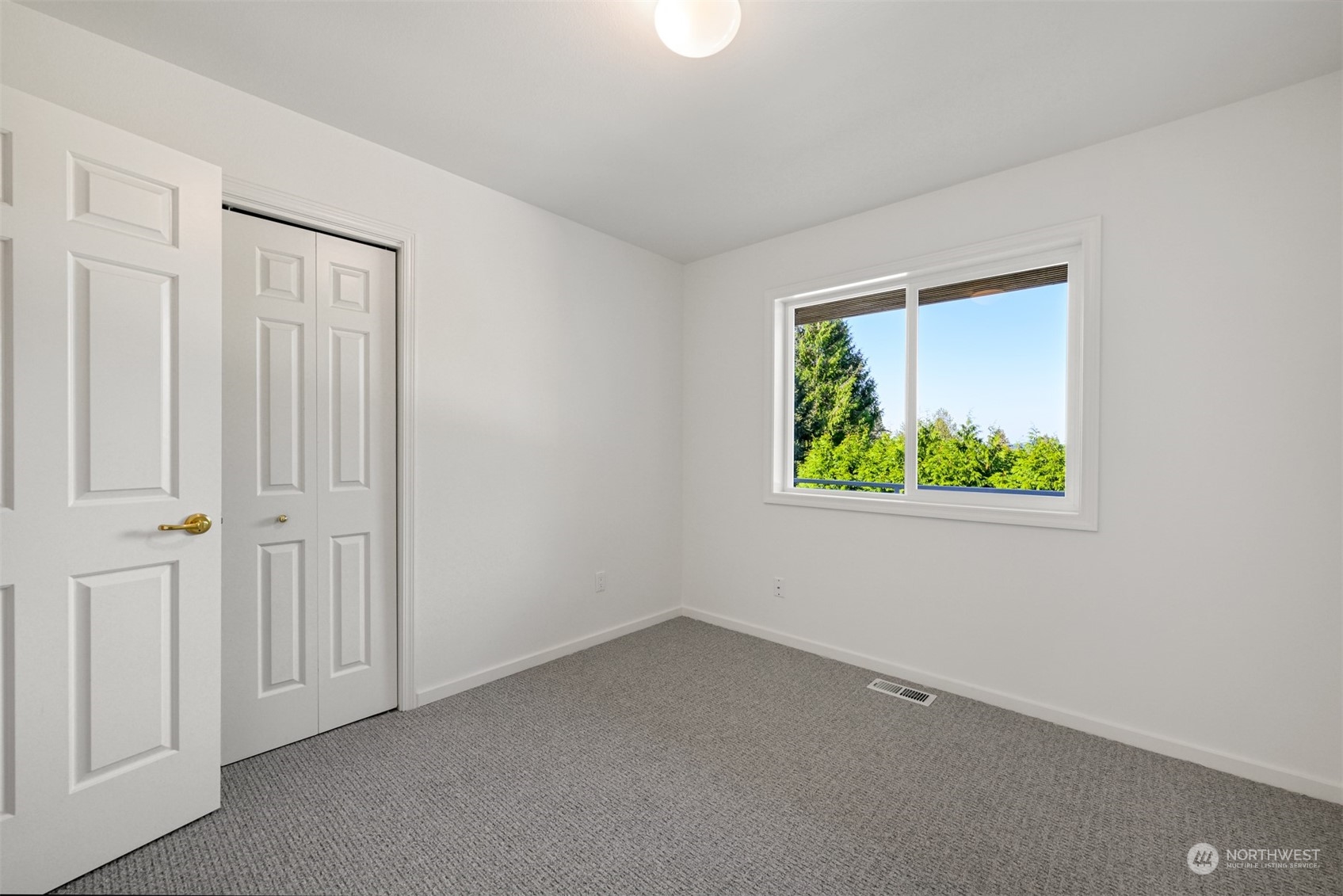 215 Bayside Road Bellingham, WA 98225 - Photo 27 of 38 an empty room with windows