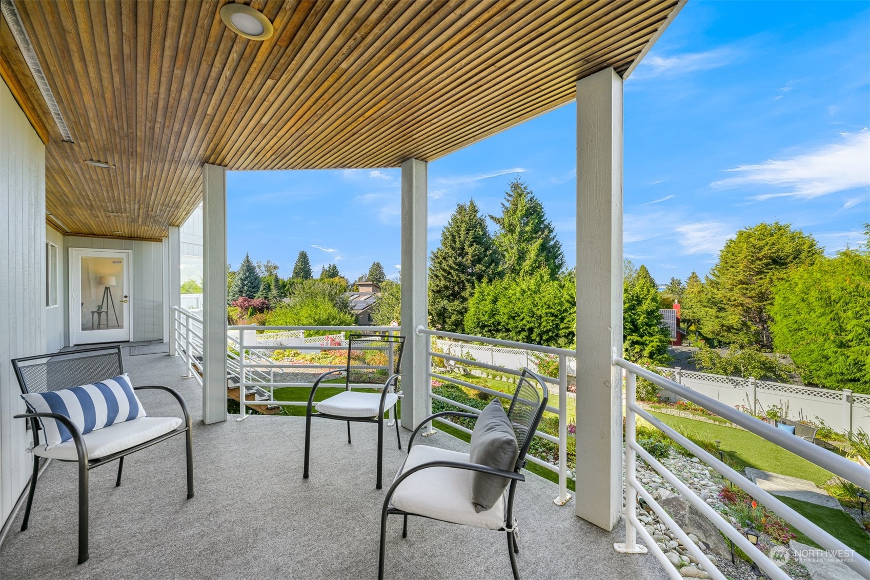215 Bayside Road Bellingham, WA 98225 - Photo 31 of 38 a balcony with table and chairs