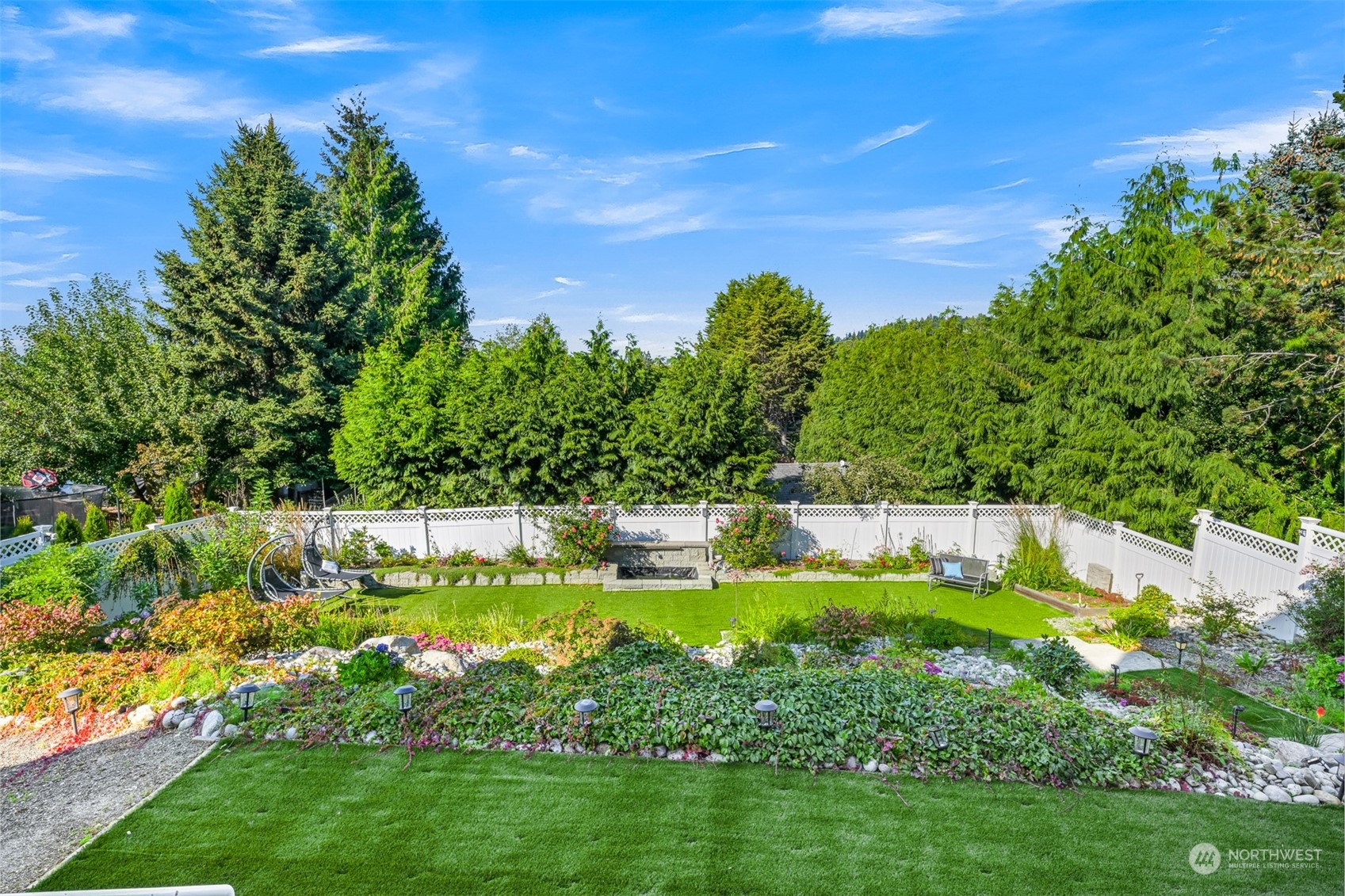 215 Bayside Road Bellingham, WA 98225 - Photo 32 of 38 a view of a swimming pool with a garden