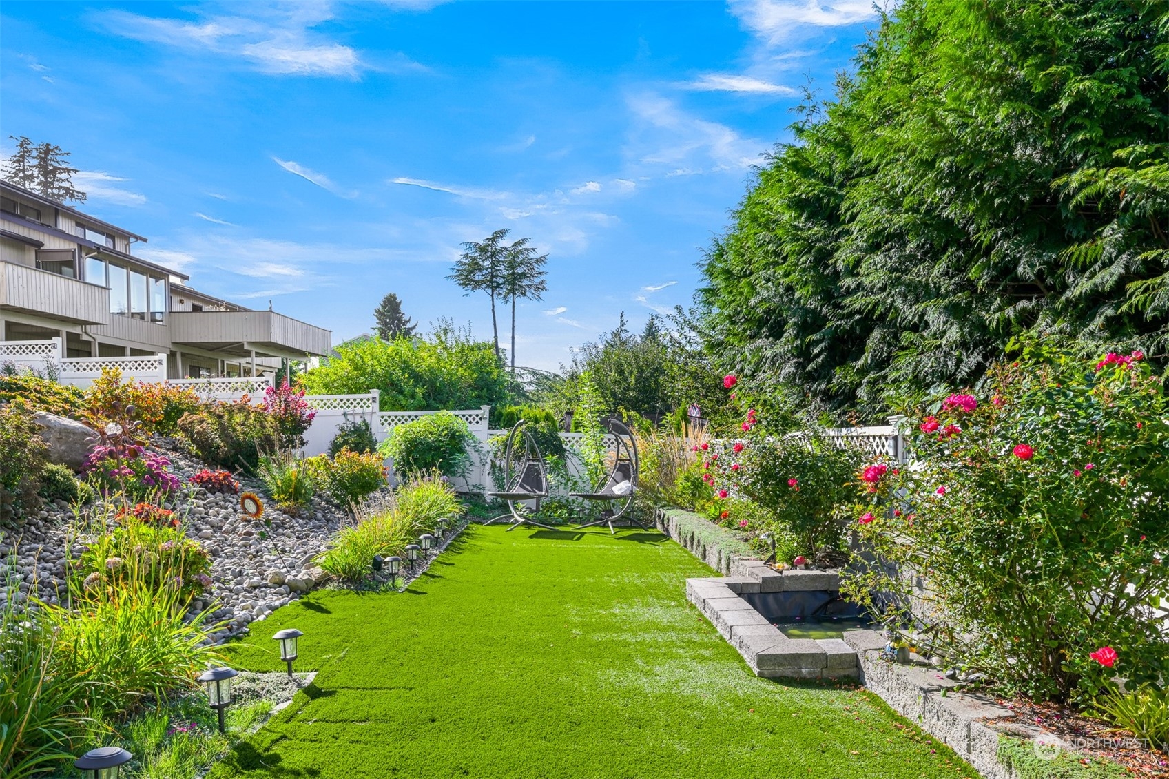 215 Bayside Road Bellingham, WA 98225 - Photo 35 of 38 a view of backyard with outdoor seating and green space