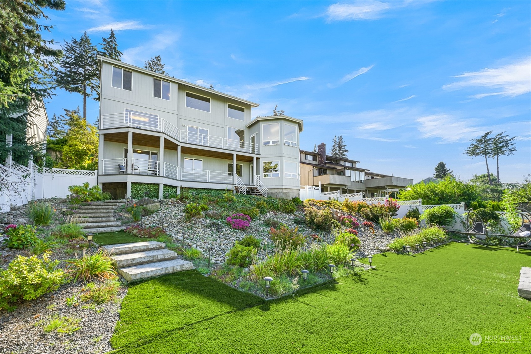215 Bayside Road Bellingham, WA 98225 - Photo 36 of 38 a front view of a house with a garden