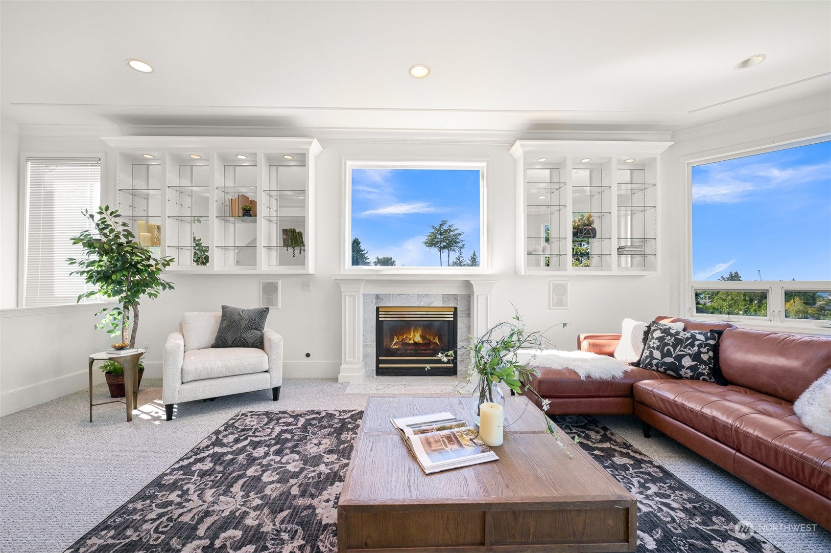 215 Bayside Road Bellingham, WA 98225 - Photo 5 of 38 a living room with furniture and a fireplace