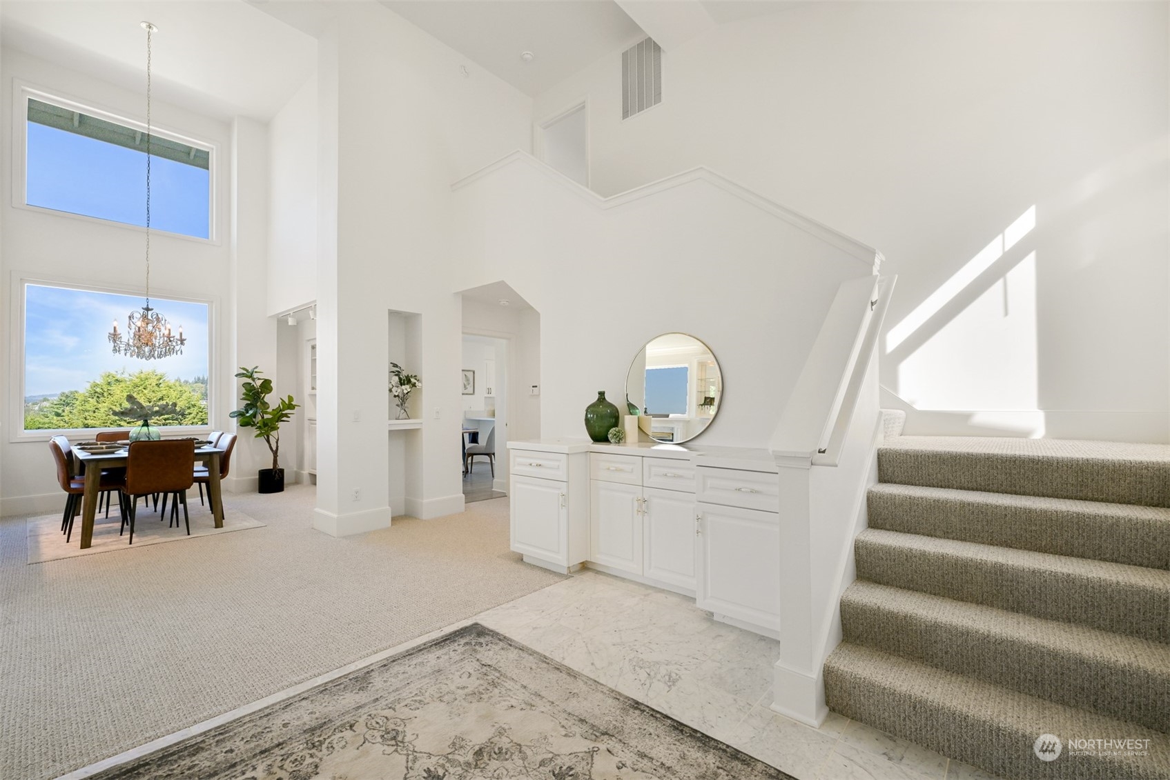 215 Bayside Road Bellingham, WA 98225 - Photo 7 of 38 a living room with furniture and a potted plant