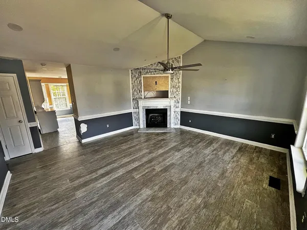 a kitchen with stainless steel appliances a stove and a refrigerator