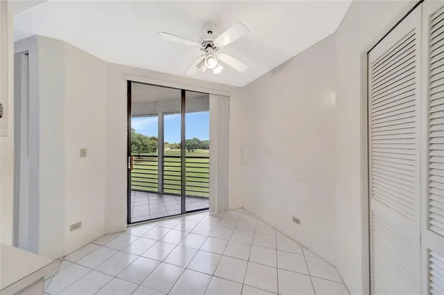 a balcony with outdoor seating and city view