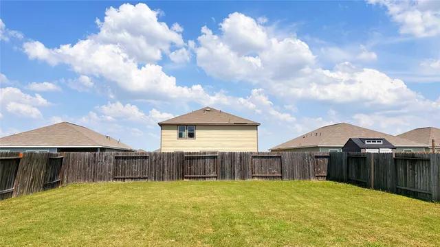 a view of backyard of house