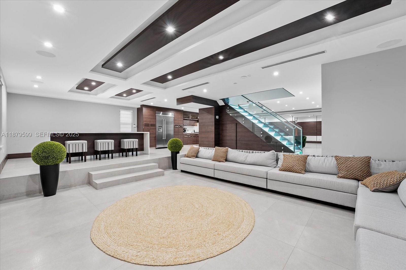 280 Northeast 156th Street Miami, FL 33162 - Photo 15 of 37 a living room with furniture and a chandelier