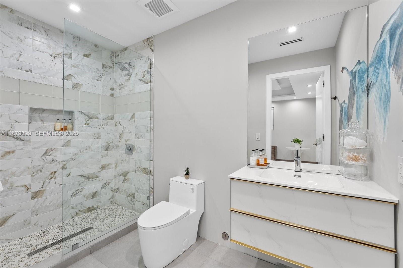 280 Northeast 156th Street Miami, FL 33162 - Photo 31 of 37 a bathroom with a sink toilet and shower