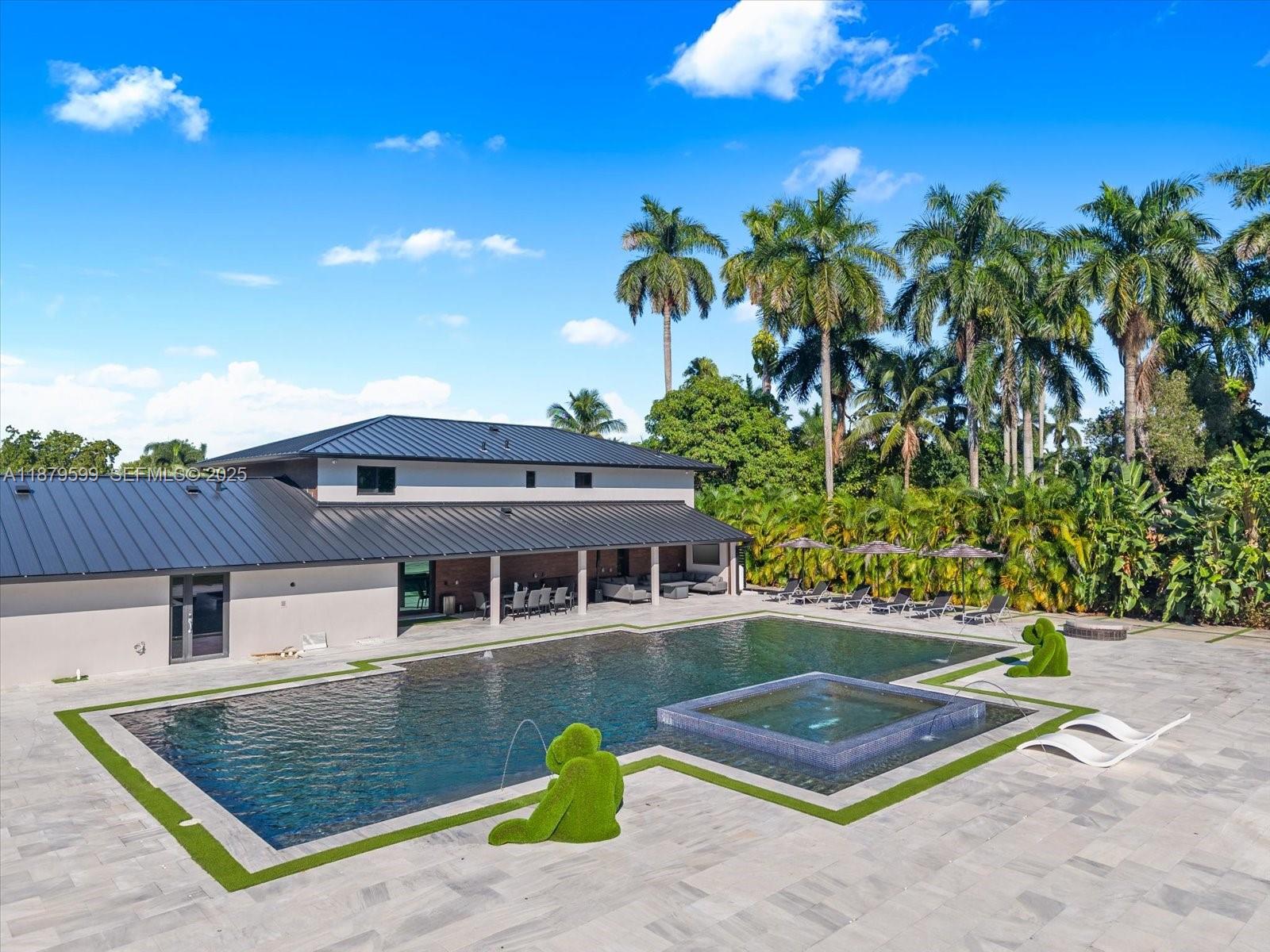 280 Northeast 156th Street Miami, FL 33162 - Photo 5 of 37 a view of a house with swimming pool