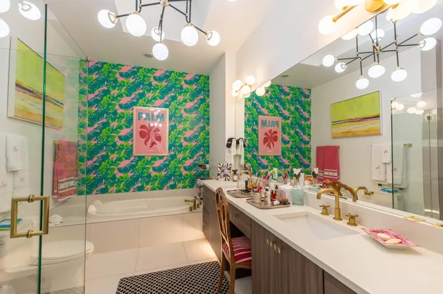 a bathroom with a toilet and a shower curtain