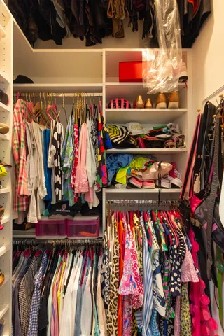 a room with storage and utility racks