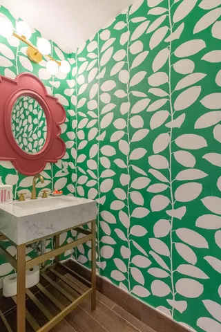 a bathroom with a toilet and a sink