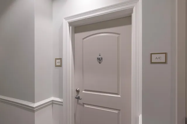 a kitchen with a sink cabinets and stainless steel appliances