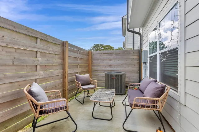 a couple of chairs sitting in front of a chair