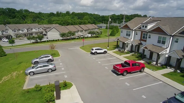 an aerial view of a house with outdoor space