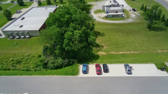 an aerial view of a house with outdoor space swimming pool and outdoor seating
