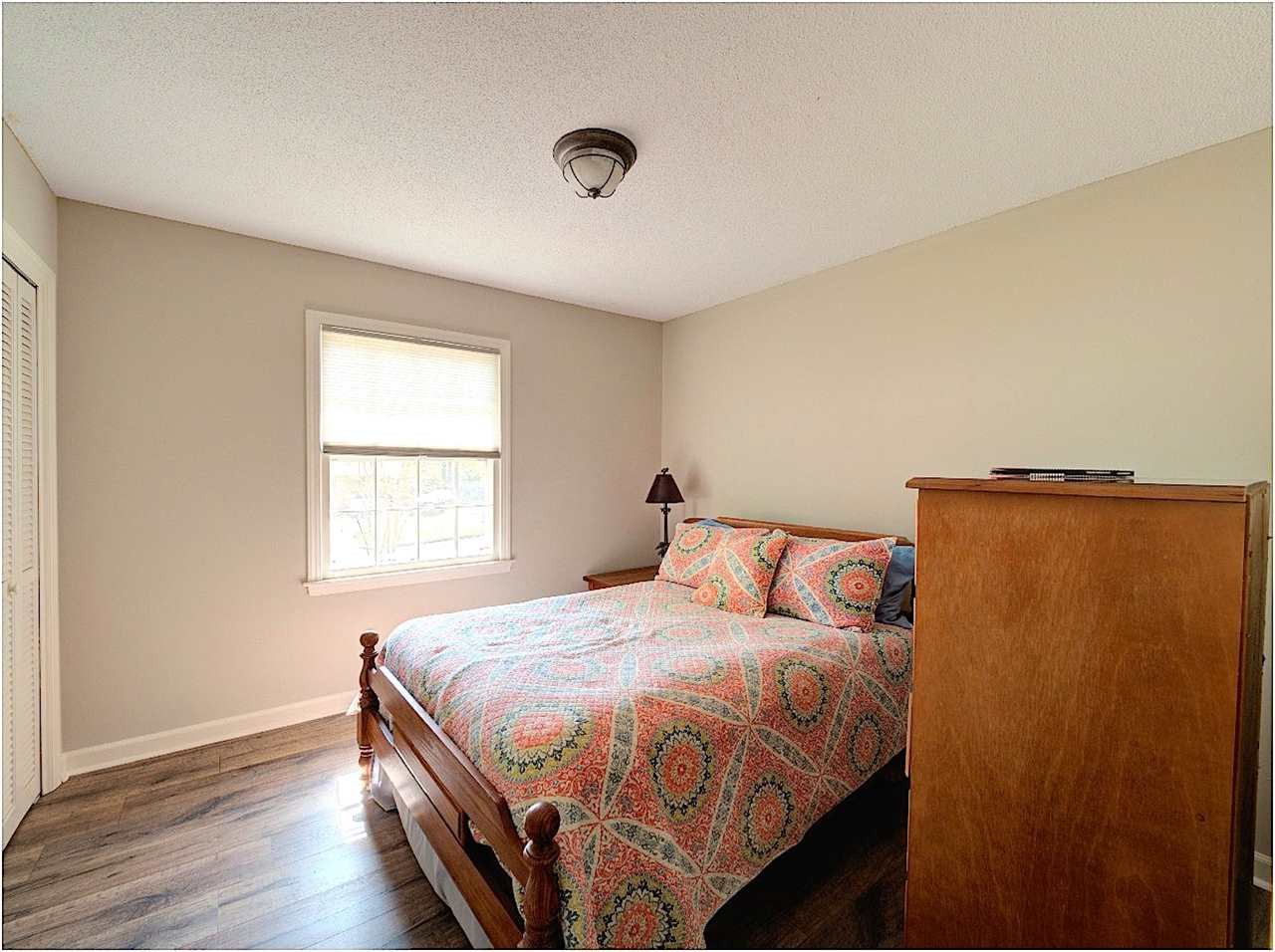 709 Barbara Drive Raleigh, NC 27606 - Photo 10 of 24 One of the secondary bedrooms. Not pictured third bedroom on main level. Secondary Bedroom