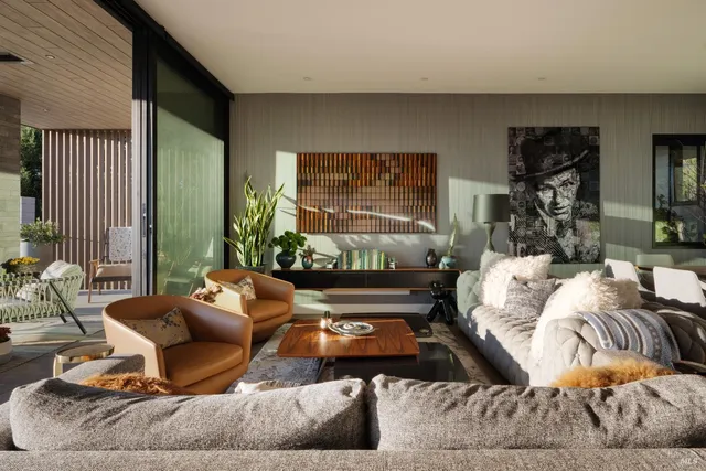a view of a terrace with furniture and potted plants