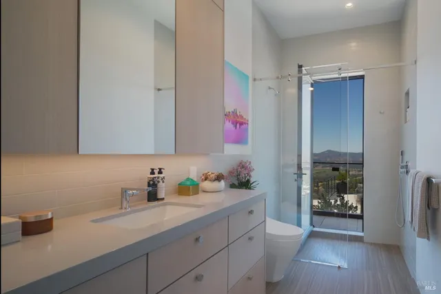 a large white bed in a small room