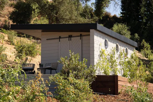 a view of a terrace with sitting area