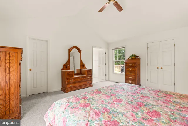 a bathroom with a sink double vanity and a mirror