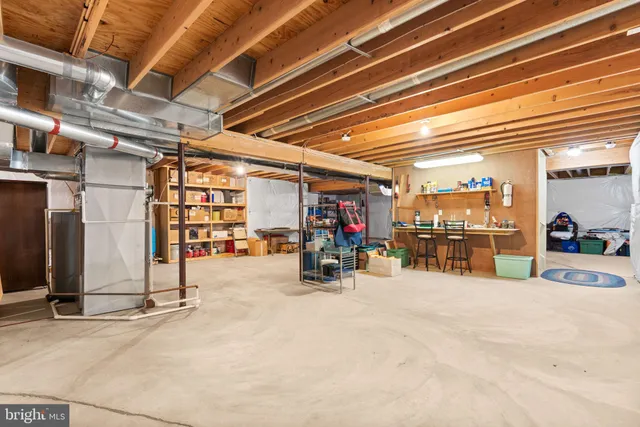 a view of a field of grass and trees