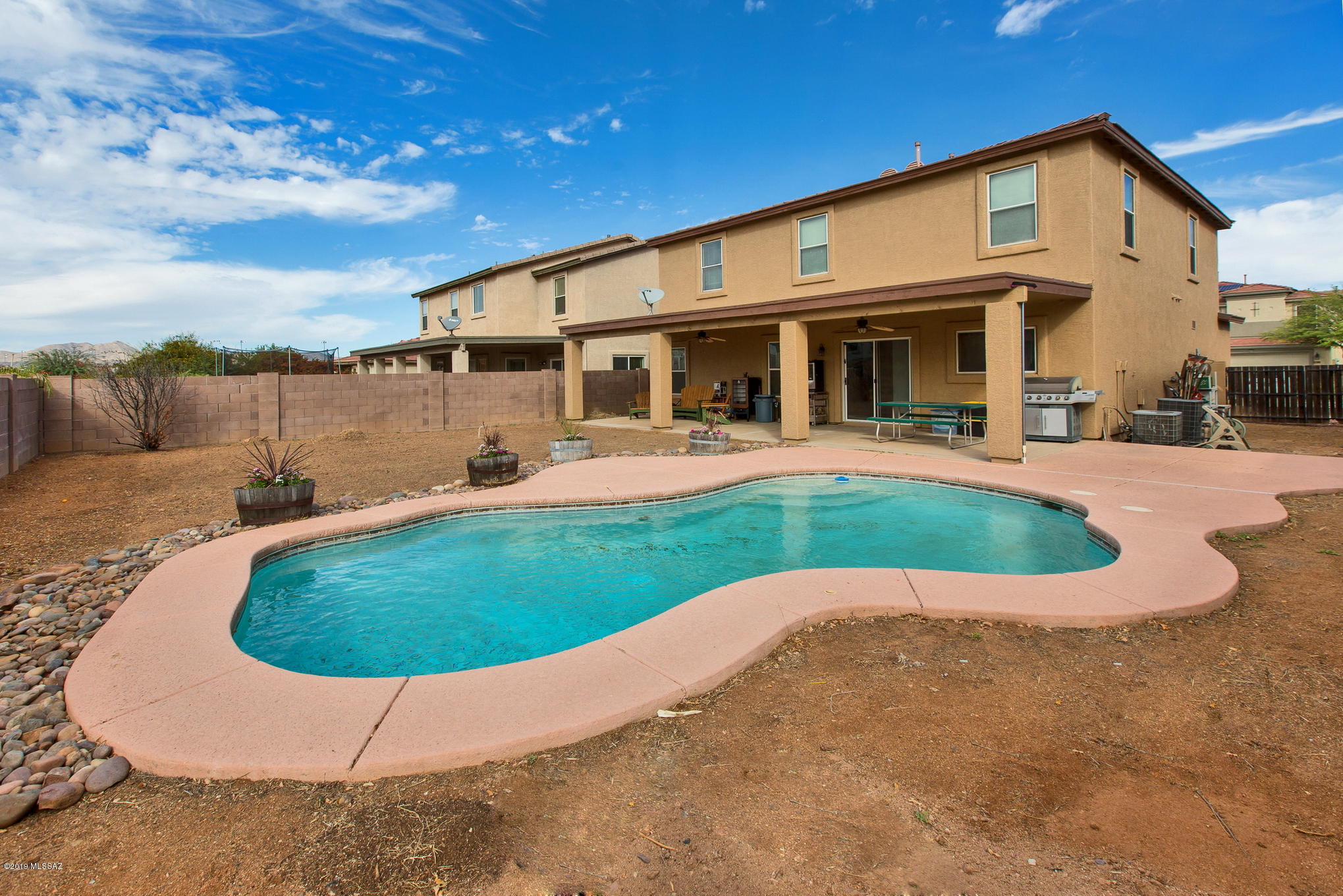 3600 East Mecate Road Tucson, AZ 85739 - Photo 20 of 39 a view of a house with a swimming pool