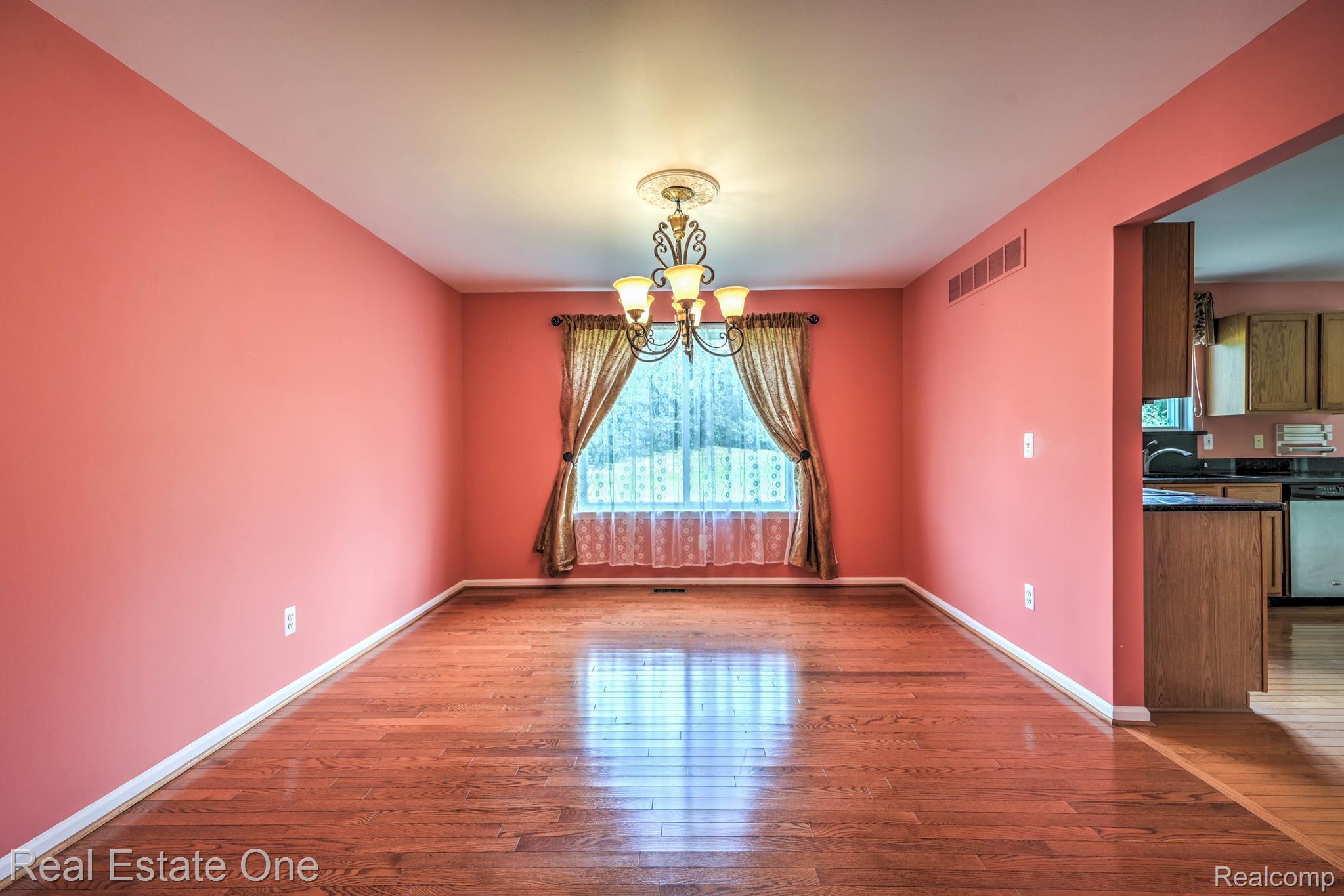 1400 Lee Wood Ridge Road Walled Lake, MI 48390 - Photo 12 of 42 Dining Area-Living Room Area View 1