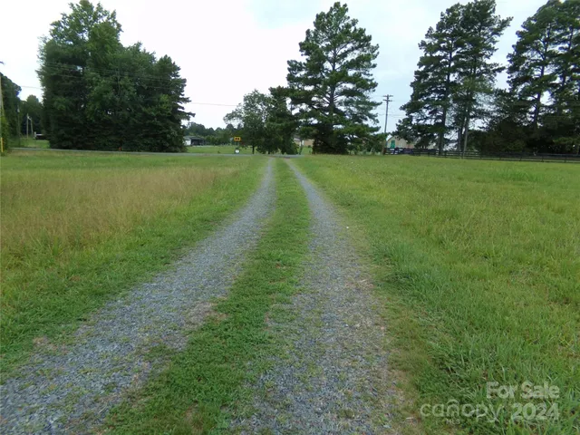 a view of a golf course with a lake
