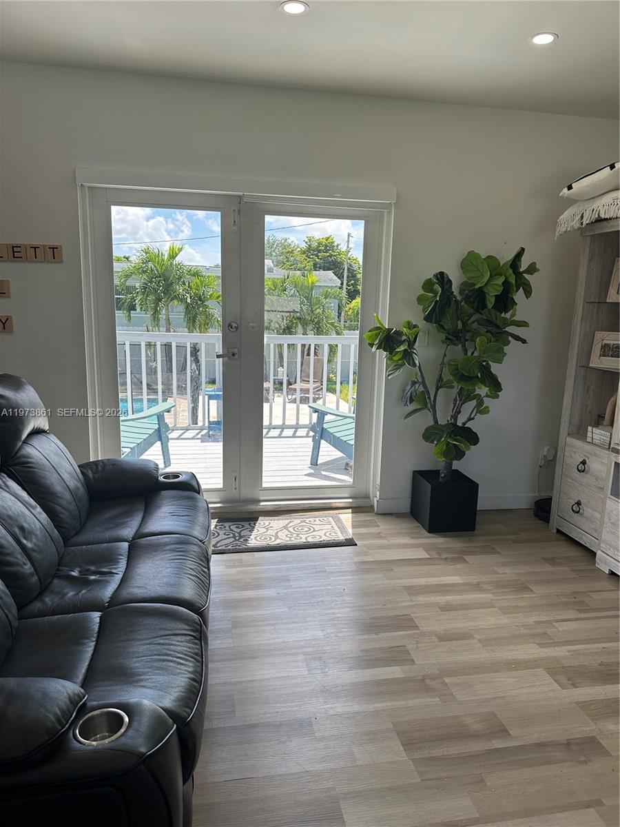 2401 Southwest 83rd Avenue Miami, FL 33155 - Photo 11 of 21 a living room with furniture and a potted plant