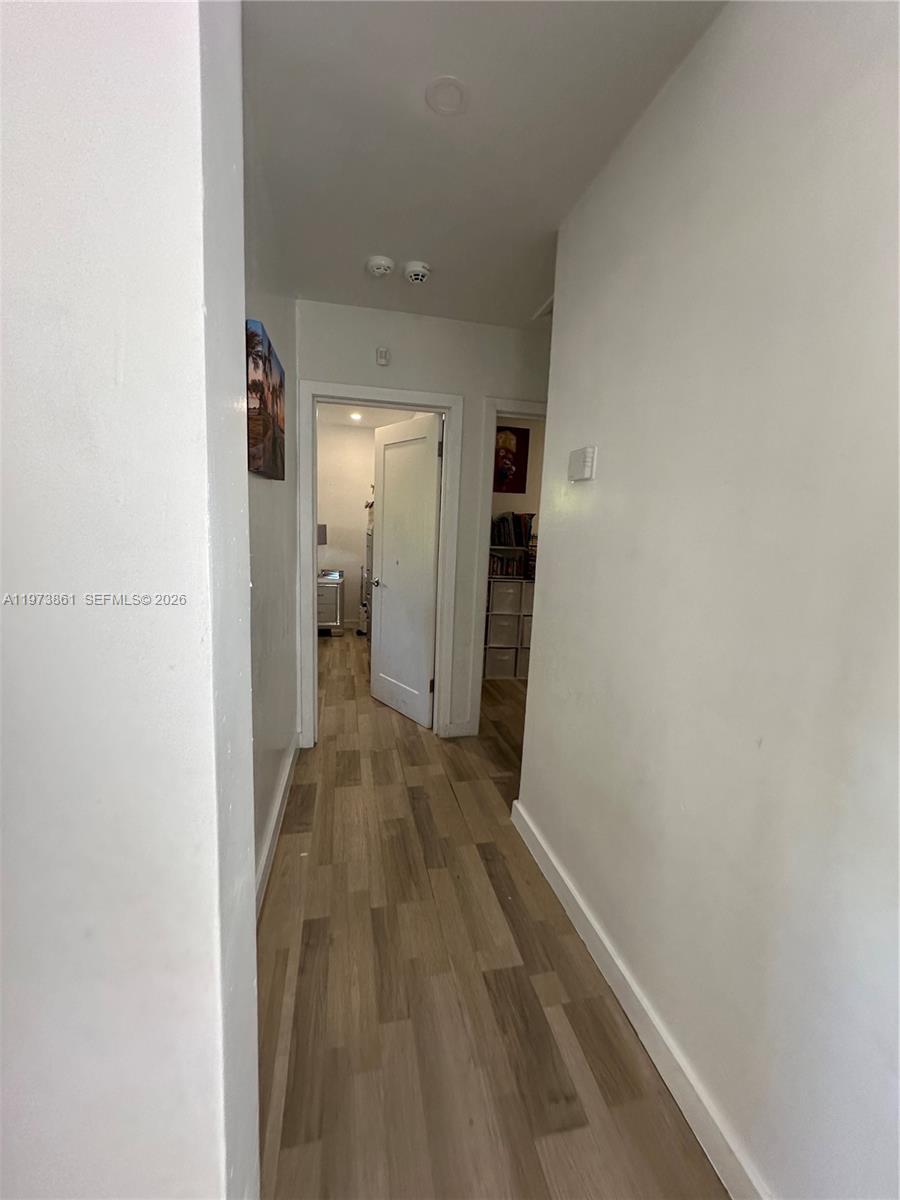 2401 Southwest 83rd Avenue Miami, FL 33155 - Photo 18 of 21 a view of hallway with wooden floor