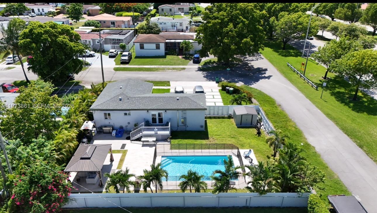 2401 Southwest 83rd Avenue Miami, FL 33155 - Photo 4 of 21 an aerial view of a house with a garden potted plants