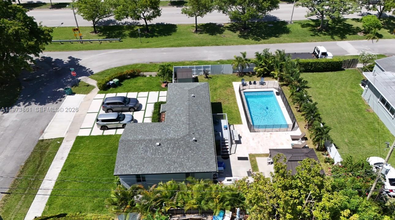 2401 Southwest 83rd Avenue Miami, FL 33155 - Photo 5 of 21 an aerial view of a house with outdoor space swimming pool and tennis court
