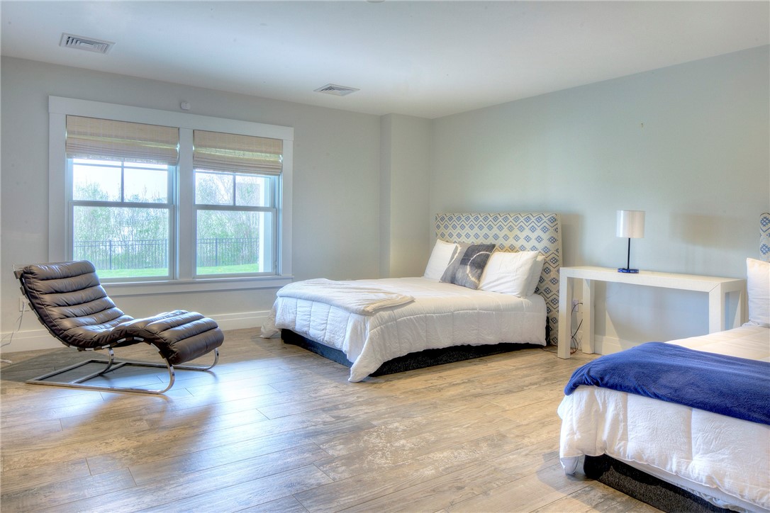 444 Purgatory Lane Middletown, RI 02842 - Photo 43 of 49 Lower Level Bedroom with views of backyard.