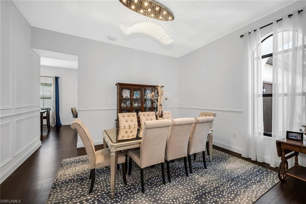 5344 Chandler Way Ave Maria, FL 34142 - Photo 15 of 47 a view of a dining room with furniture