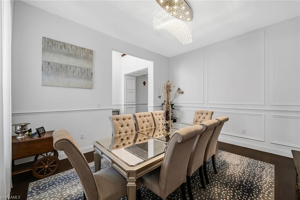 5344 Chandler Way Ave Maria, FL 34142 - Photo 17 of 47 a view of a dining room with furniture