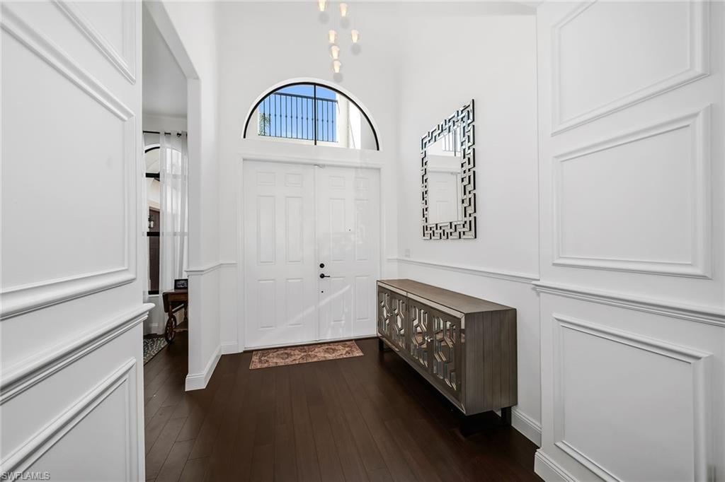 5344 Chandler Way Ave Maria, FL 34142 - Photo 36 of 47 a view of an entryway with wooden floor