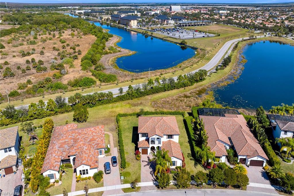 5344 Chandler Way Ave Maria, FL 34142 - Photo 44 of 47 an aerial view of a house with a swimming pool
