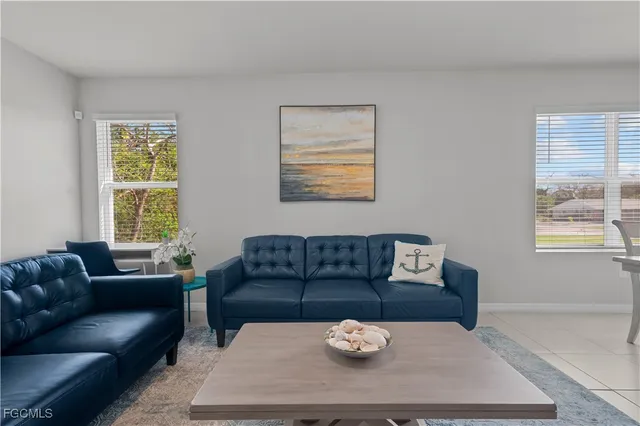 a view of a livingroom with furniture and a couch