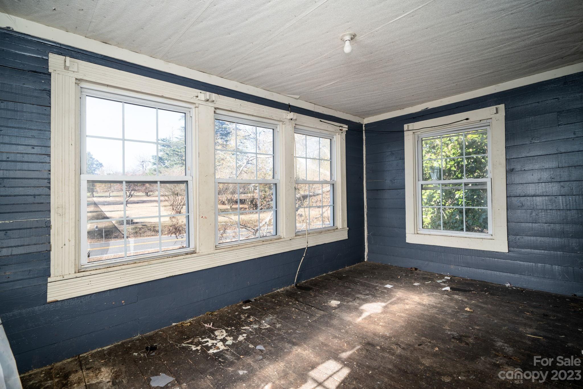 596 Old Mooresboro Road Mooresboro, NC 28114 - Photo 17 of 40 a view of an empty room with a window