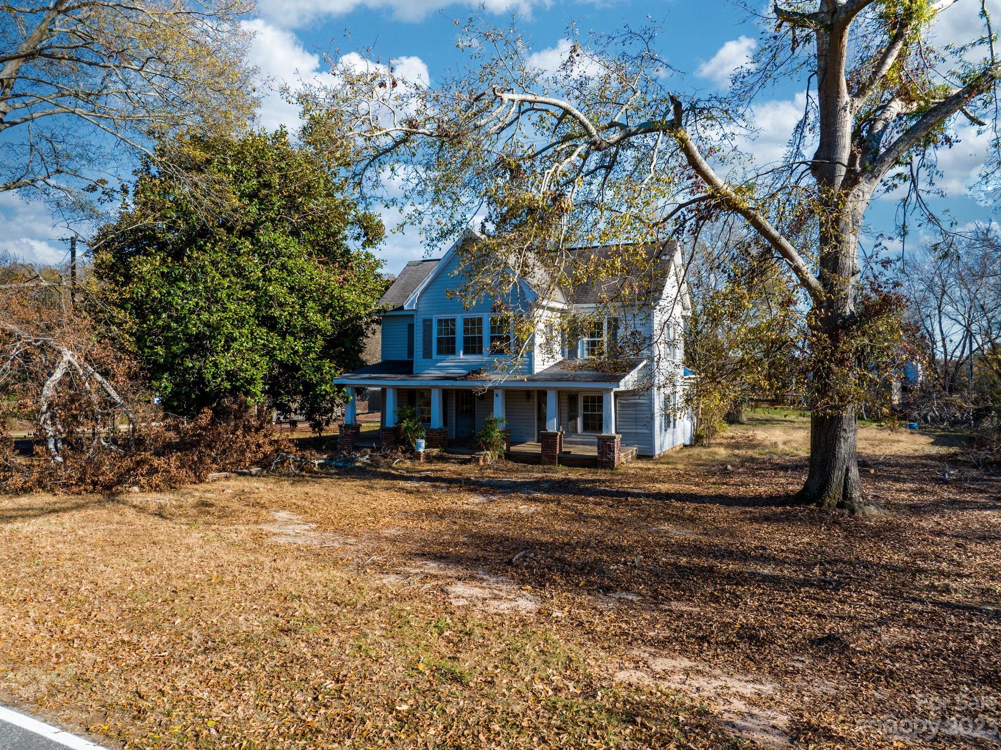596 Old Mooresboro Road Mooresboro, NC 28114 - Photo 18 of 40 a front view of a house with a garden