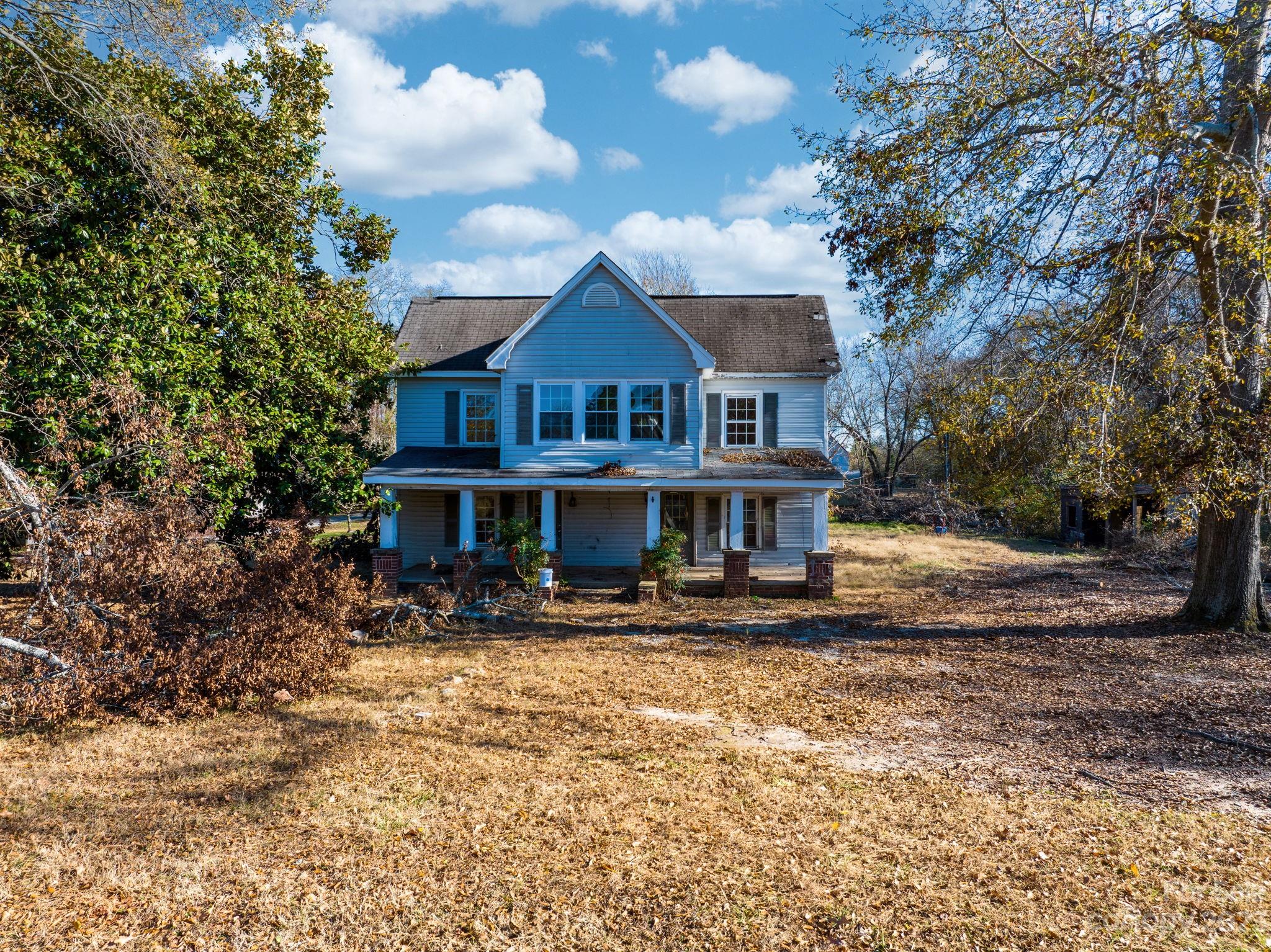 596 Old Mooresboro Road Mooresboro, NC 28114 - Photo 19 of 40 a view of a house with a yard