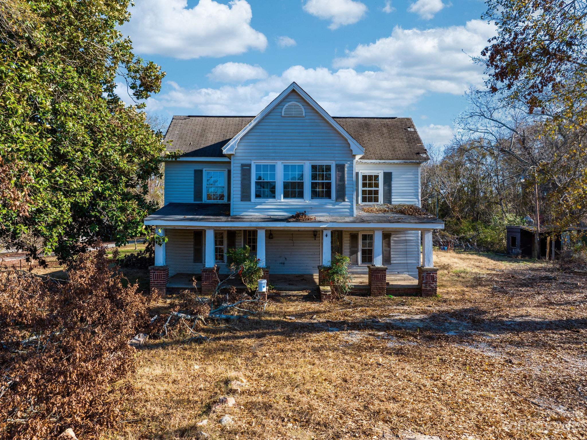 596 Old Mooresboro Road Mooresboro, NC 28114 - Photo 20 of 40 a front view of a house with swimming pool